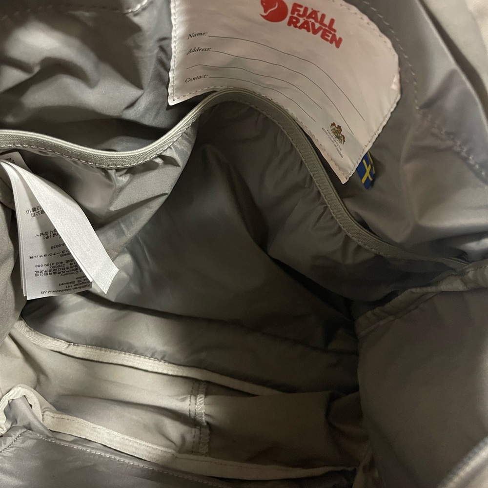 Grey Fjällräven tote bag designed with top handles and a shoulder strap